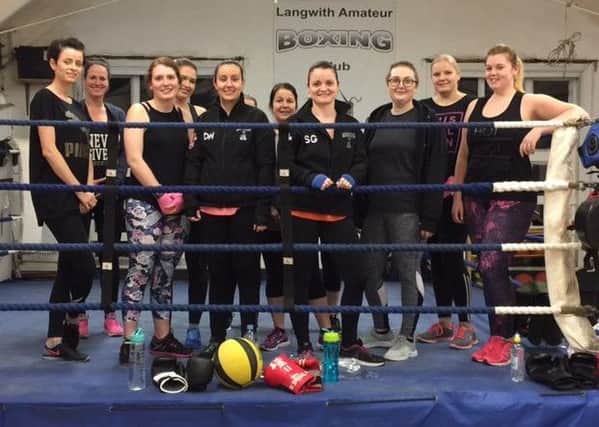 Stacey Gorrill and Danielle Humphries with some of their boxing and fitness class members at Langwith ABC.