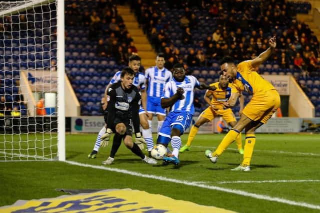 Mansfield Town's Rhys Bennett tries a shot on goal - Photo by Chris Holloway