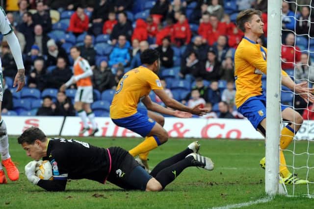 Mansfield Town v Plymouth Argyle.
Frustration shows late in the second half