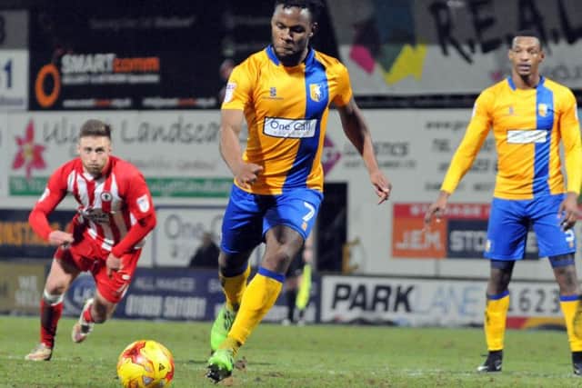 Mansfield v Accrington Stanley.Shaquile Coulthirst scores the Stags' penalty to level the score at 3 all.