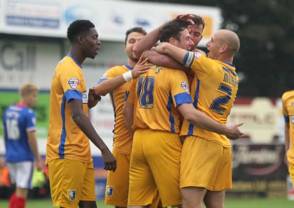 Lee Beevers is congratulated after scoring for Mansfield -Pic by: Richard Parkes