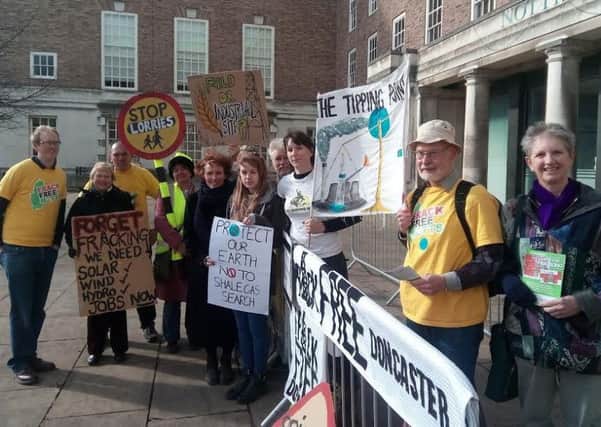 Members of Frack Free groups from Nottinghamshire, Lincolnshire, Newark and East Leake, protested outside County Hall in Nottingham on Tuesday.