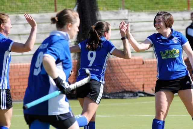 North Notts Ladies Hockey action against Loughborough Students at the Manor Complex on Saturday morning.   
Lil Robinson celebrates her second goal with team mates.