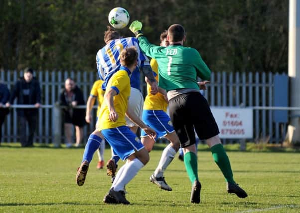 Action from the league cup semi-final between FC Bolsover and Hucknall Town.