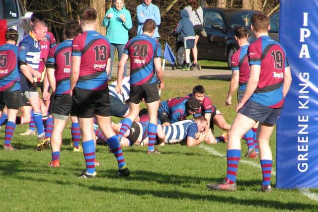 Phil Pogmore squeezes down for a try during Mansfields fightback from 26-12 down against Rolls-Royce.