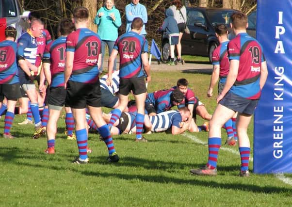 Phil Pogmore squeezes down for a try during Mansfields fightback from 26-12 down against Rolls-Royce.