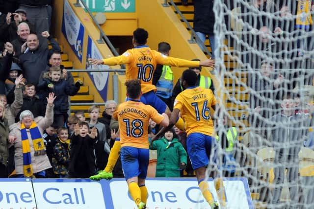 Mansfield Town v Carlisle United.
Matt Green rises to take the applause after putting Mansfield into the lead.