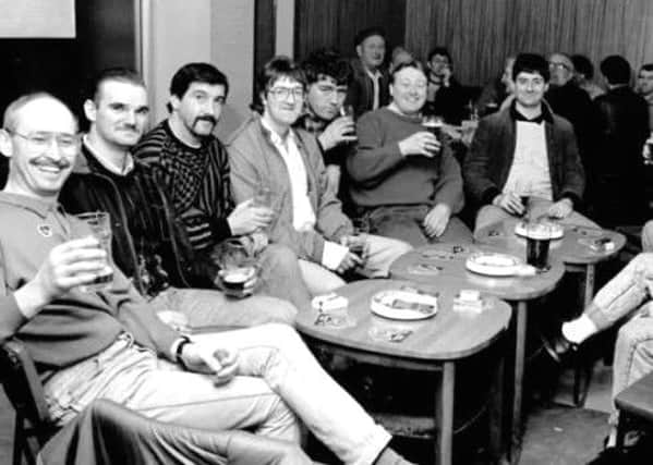 Mansfield miners having a drink after their last shift.