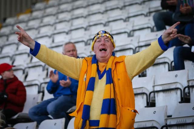 Mansfield Town's fans at Morecambe FC  - Photo by Chris Holloway
