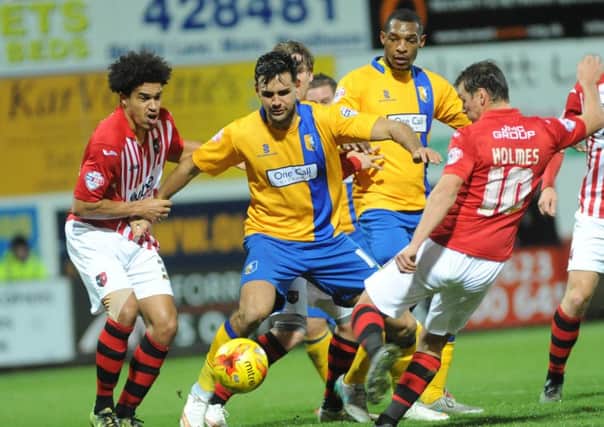 Mansfield Town v Exeter City - Skybet League Two - One Call Stadium - Tuesday 24th November 2015
Ryan Tafazolli battles with Lee Holmes and Troy Brown