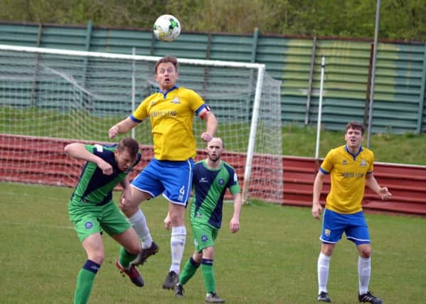 Action from FC Bolsovers costly 2-1 home defeat against AFC Bentley. (PHOTO BY: Pete Waby).