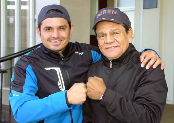 Boxing legend Roberto Duran, pictured with his son, Roberto Junior, during a recent visit to Blackpool.