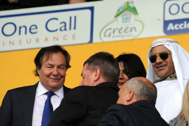 Stags owner John Radford with Mr Mansour Cin Hamad Al Stagni, putting a smile on the face of Mansfield Town last weekend.