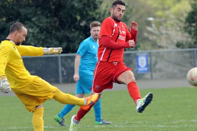 AFC Mansfield scorer Phil Buxton puts pressure on Clipstone's keeper. PHOTO: Anne Shelley