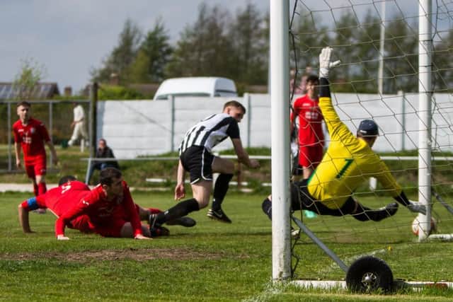 A close shave during the game between Clipstone and Armthorpe Welfare. (PHOTO BY: Andy Sumner)