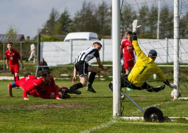 A close shave during the game between Clipstone and Armthorpe Welfare. (PHOTO BY: Andy Sumner)