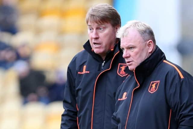 Mansfield Town manager Steve Evans with assistant Paul Raynor behindPicture by Dan Westwell