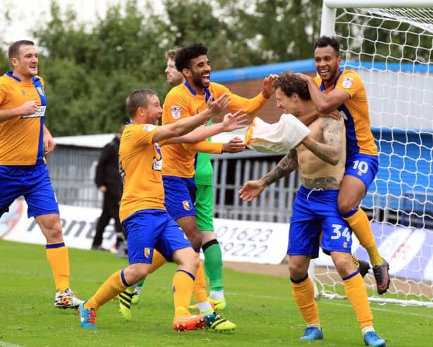 Mansfield Town v Notts County, Saturday October 8th 2016. Mansfield Town player Darius Henderson celebrates after scoring the 3rd goal. Picture: Chris Etchells