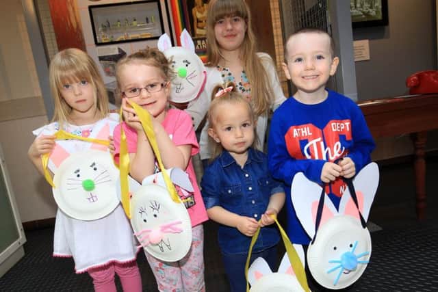 Easter craft making at Mansfield Museum. Youngsters pictured with Easter bunny bags they had made.