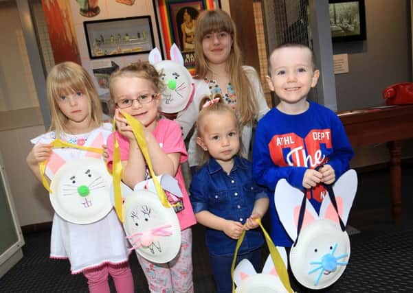 Easter craft making at Mansfield Museum. Youngsters pictured with Easter bunny bags they had made.