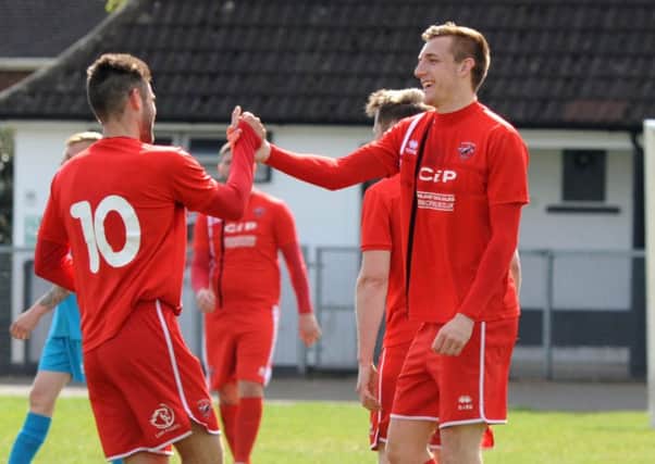 Action from Saturday's game against AFC Mansfield and Clipstone.
Mansfield's first goal scorer, Phil Buxton, (10) congratulates their second, Ollie Fearon.