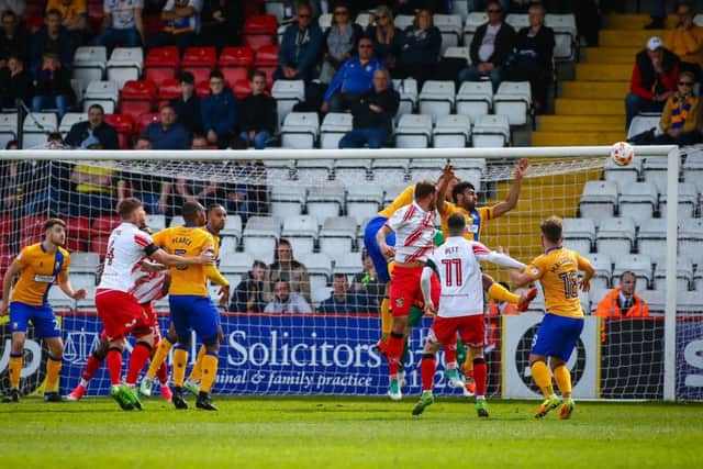 Mansfield Town's defence holds strong - Photo by Chris Holloway