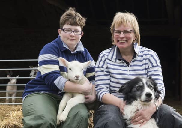 Shared Lives carer Jean Bere, right, on her farm with Terri-ann Davies. Picture: Tracey Whitefoot.