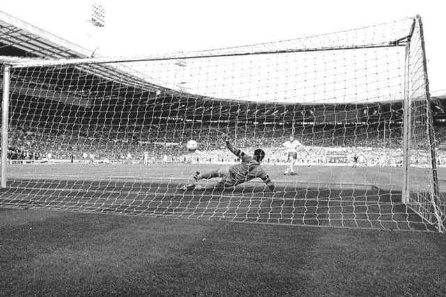 Kevin Hitchcock kicks away Gordon Owen's penalty in the 1987 Freight Rover Trophy final shoot-out.