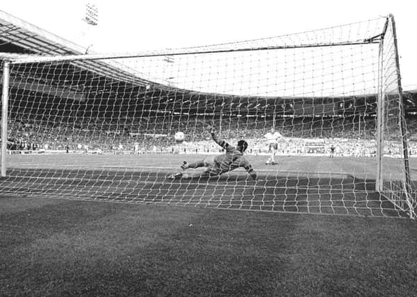 Kevin Hitchcock kicks away Gordon Owen's penalty in the 1987 Freight Rover Trophy final shoot-out.