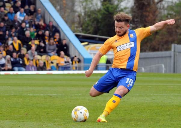 Mansfield Town v Portsmouth.
Alex MacDonald takes a first half shot at goal.