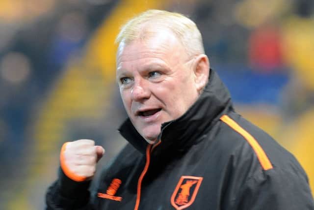 Steve Evans.