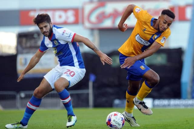 Mansfield Town v Blackburn Rovers.
Rhys Bennett dances round the Blackburn's Stephen Hendrie.