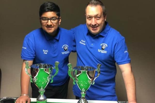Newly-crowned European pool champions Suraj Rai and Kev Seaman with their trophies.
