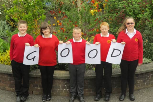 Five pupils at Northfield Primary and Nursery spell out how good the school is, according to Ofsted inspectors.