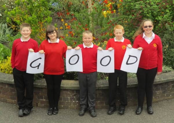 Five pupils at Northfield Primary and Nursery spell out how good the school is, according to Ofsted inspectors.