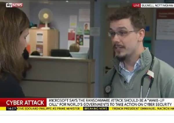 Dr Andrew Foster, of the Parkside Medical Practise, tells a reporter about the chaos caused following Friday's NHS cyber attack.