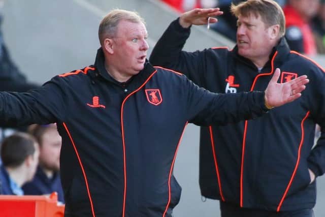 Mansfield Town's Manager Steve Evans with his assistant Paul Raynor - Photo by Chris Holloway