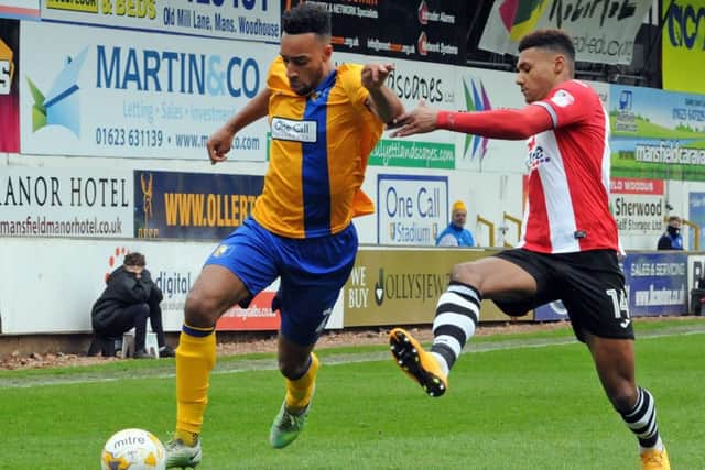 Mansfield Town v Exeter.Rhys Bennett in first half action.
