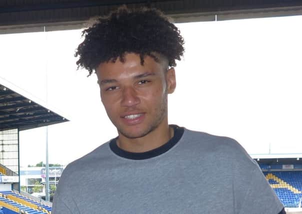 Stags CEO Carolyn Radford welcomes Lee Angol to the club .
