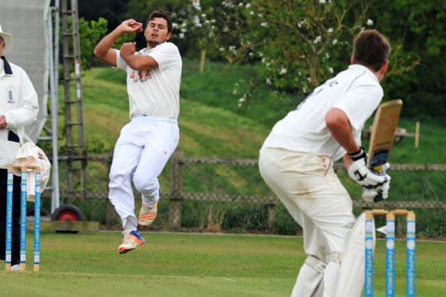 Papplewick and Linby v Anston.Beyes Swanepoel in bowling action for Anston.