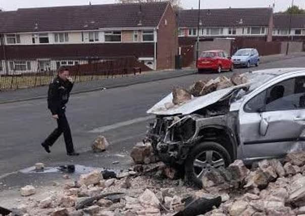 A scene of devastation on Rock Street, Bulwell, after a car crashed into a wall on May 9