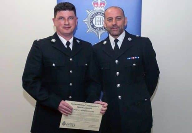 Commended PC Matt Steel is congratulated by Chief Superintendent Mark Holland. PHOTO: PS Chris Holloway
