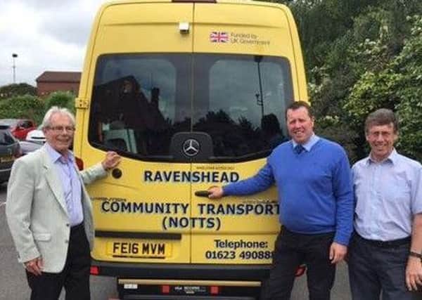 Ravenshead Community Transport: chairman David Grenham and trustee Paul Baskcomb with local MP Mark Spencer (centre)