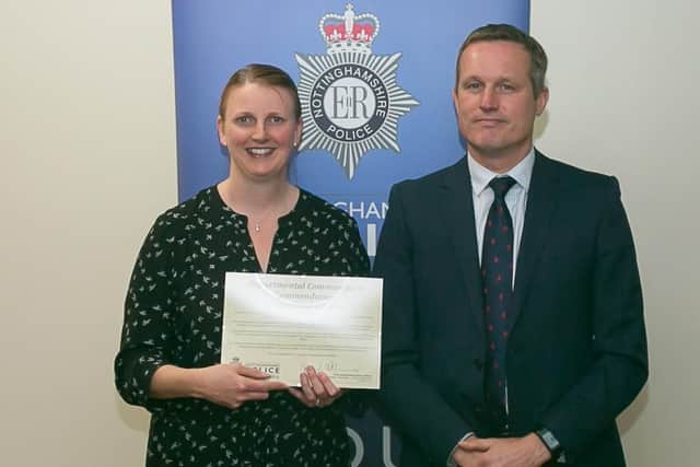 DC Kerry Shippam is congratulated by Detective Superintendent Rob Griffin