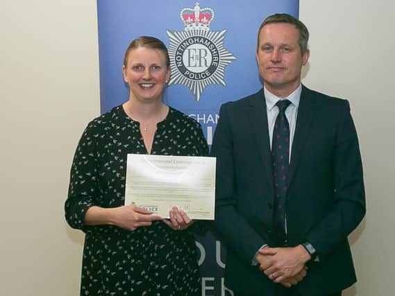 DC Kerry Shippam is congratulated by Detective Superintendent Rob Griffin