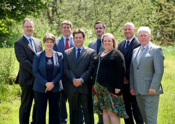 The senior management team at Robert Woodhead Ltd, led by managing director David Woodhead (far left). Also pictured, from left, are Teresa Westwood, Glenn Slater, Steve Gribby, Tom Woodhead, Hilary Cheshire, Craig Pygall and Derek McGrath.