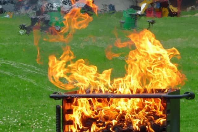 Blazing barbecue. Photo by Pixabay.