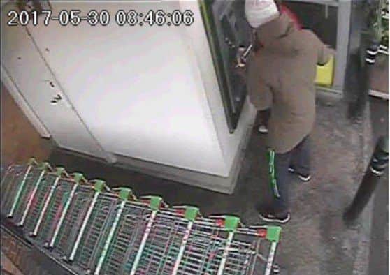 A woman was robbed at knifepoint at a Mansfield cashpoint.