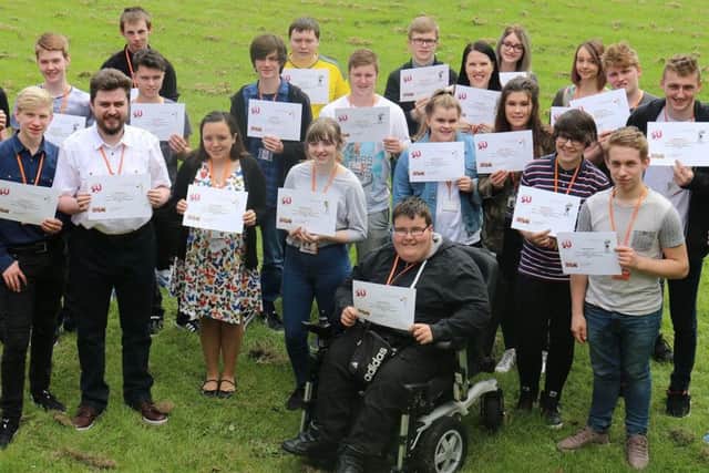 Some of the young volunteers who have contributed a combined 7,800 hours of voluntary work.