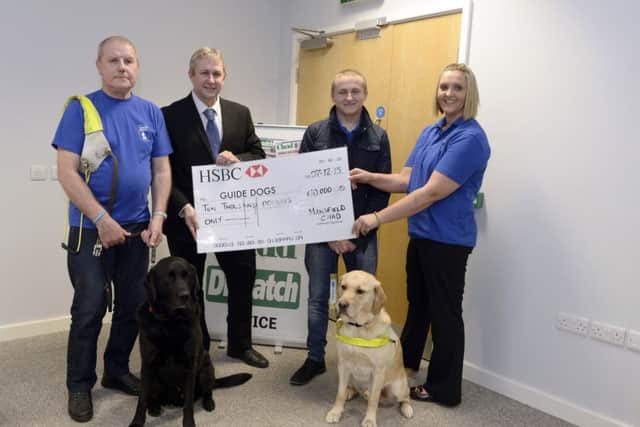 Mansfield Chad supporting Guide Dogs for the Blind. From left, Bryan Fox with Pluto, Jon Ball, Nathan Edge with Hudson and Nichola Bonsall